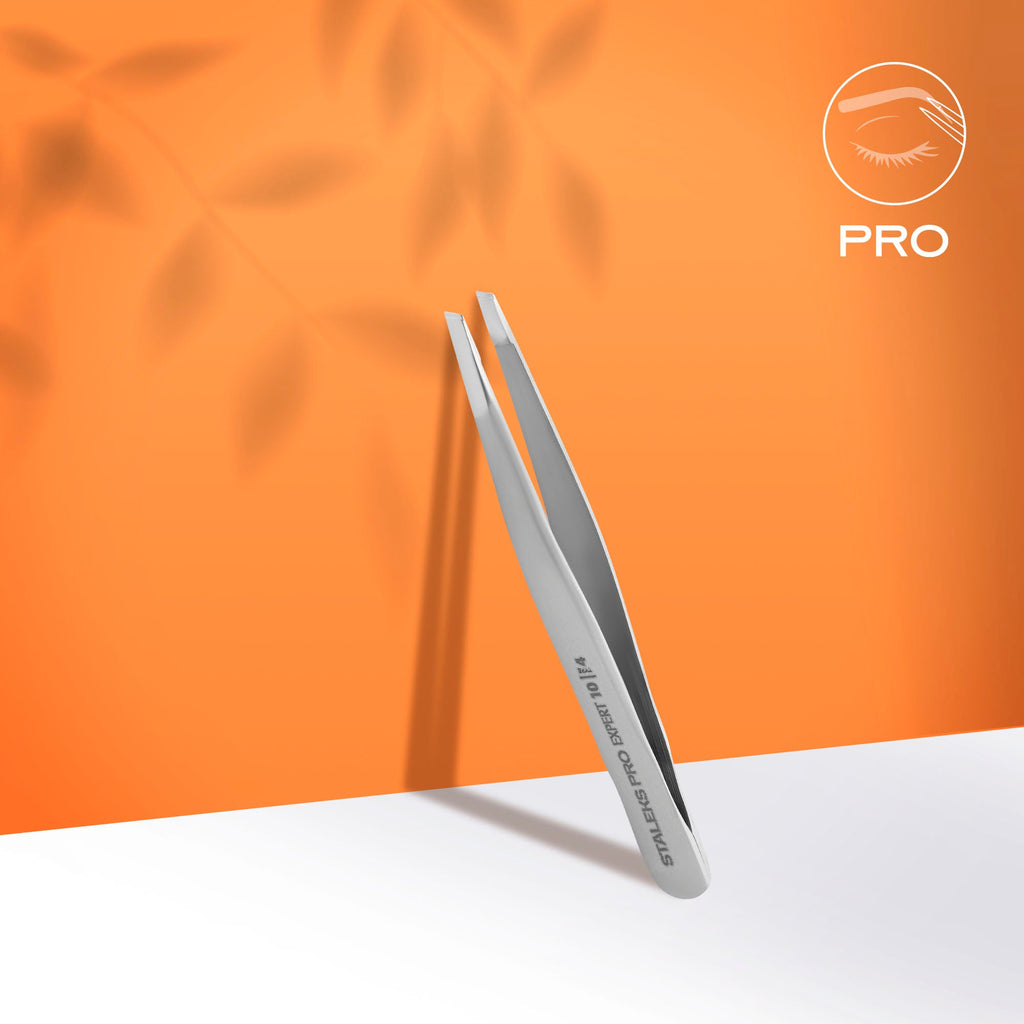 STALEKS EXPERT 10 TYPE 4 antakių pincetas – pincetas ant oranžinio fono